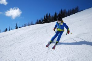 kid skiing on mountain